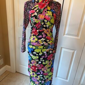 Anthropologie floral dress with ruched sides and sheer sleeves medium